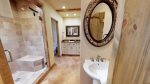 Master bathroom with walk in shower and private water closet 